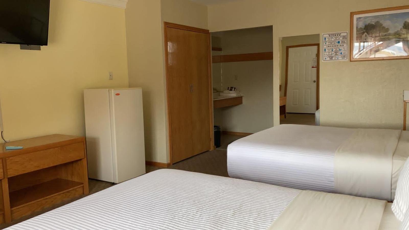 La Huerta Inn&Suites Cuauhtémoc Habitación foto